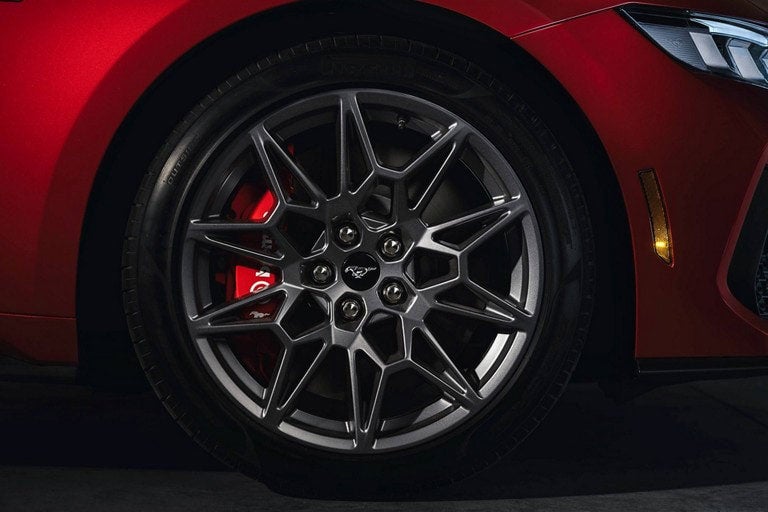 2024 Ford Mustang® model with a close-up of a wheel and brake caliper | V & H Ford of Marshfield in Marshfield WI